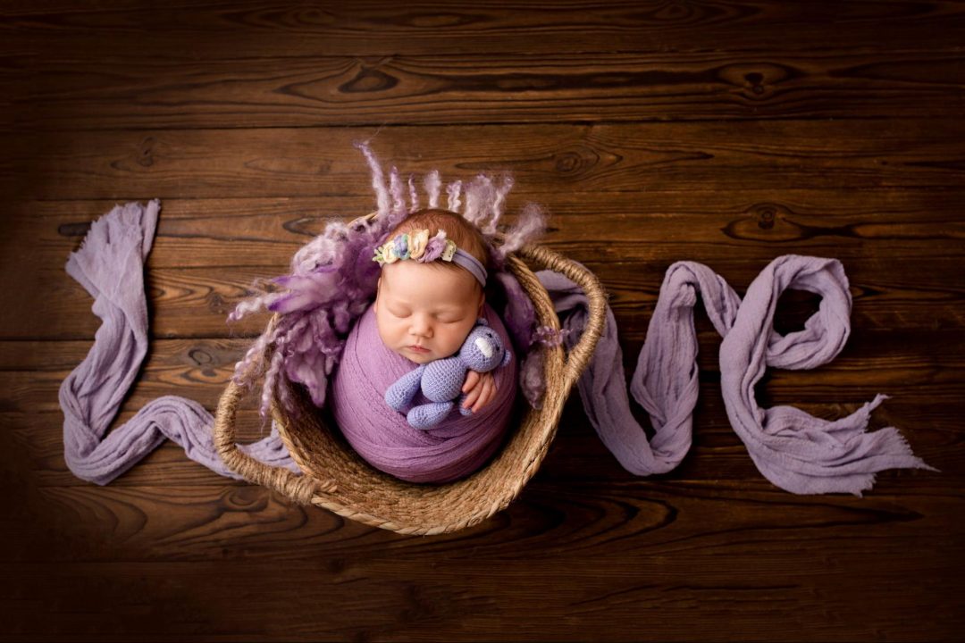 Baby boy with antique props